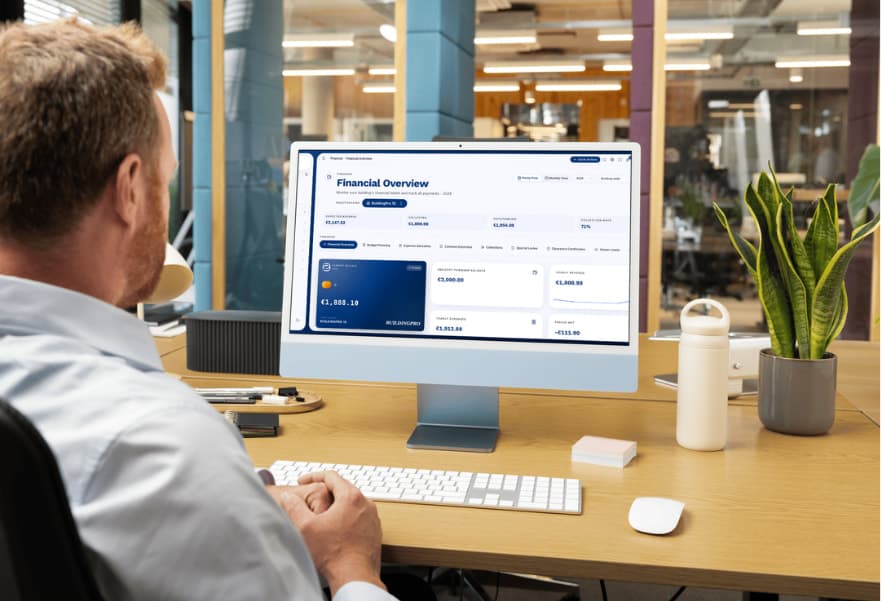 A property manager reviewing a building's financial overview in BuildingPro